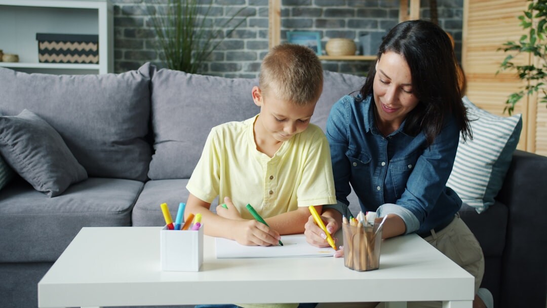 Family sitting together reviewing paperwork at home