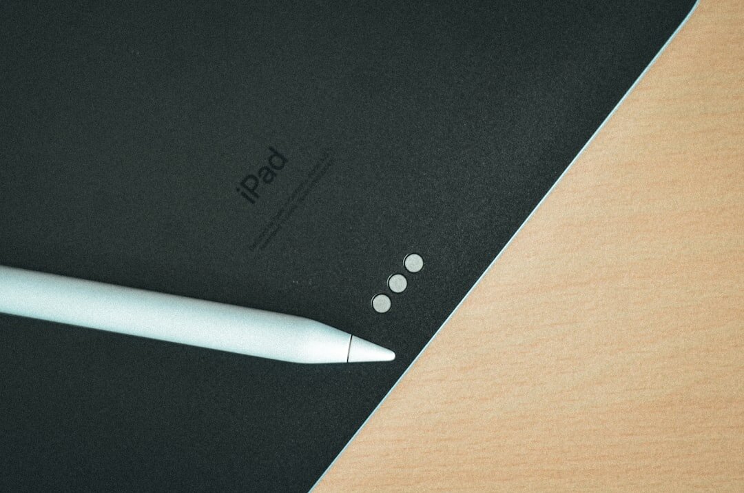 Flat lay of legal documents, pen and folder on a desk